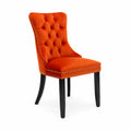 Chaise en velours orange avec pieds en bois
